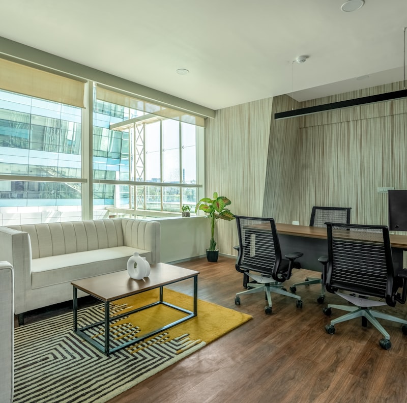 A sleek, minimalist office space with natural light highlighting clean lines.